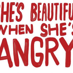 sign reading she's beautiful when she's angry in red paint